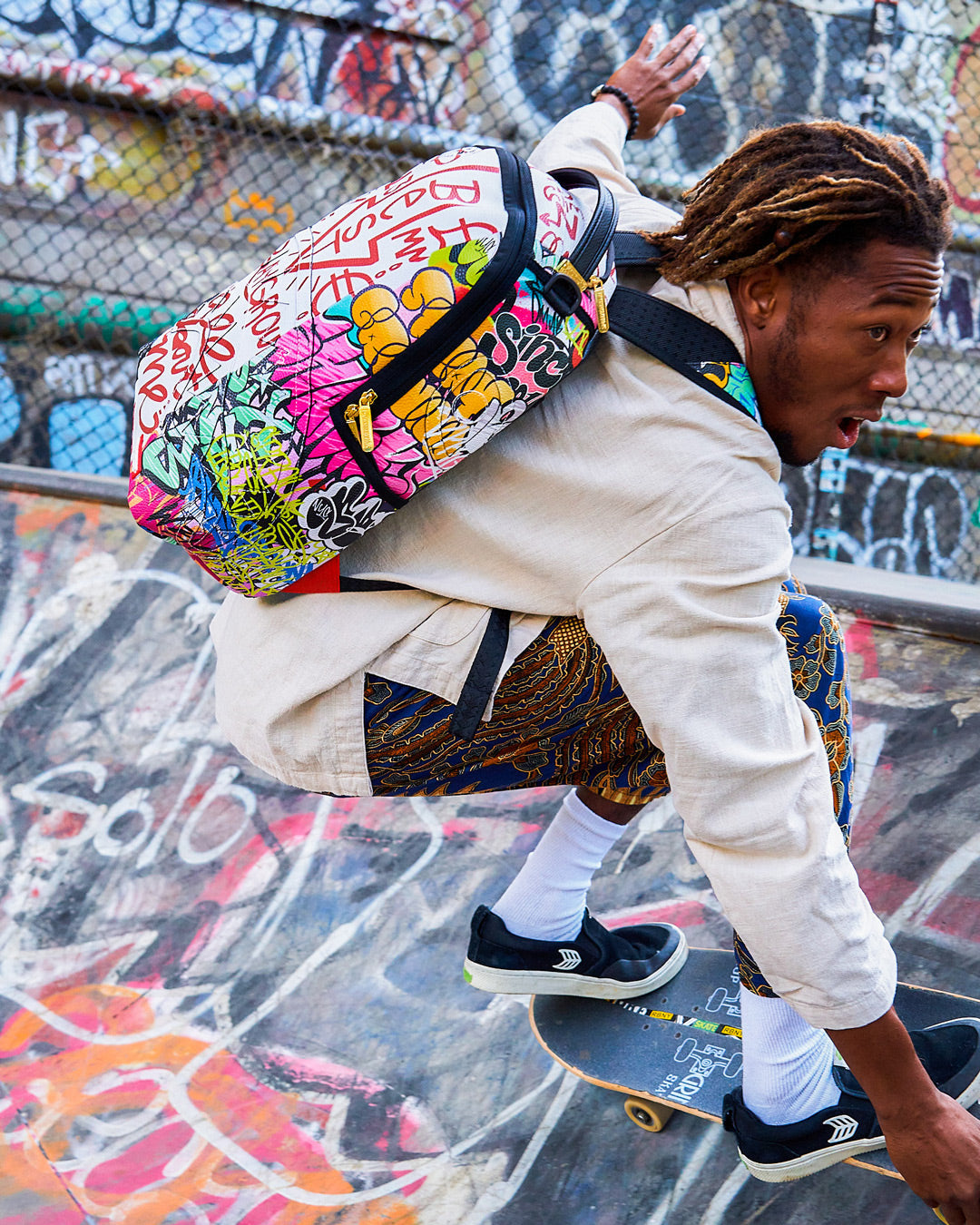 TRI-SPLIT GRAFFITI BACKPACK (DLXV)