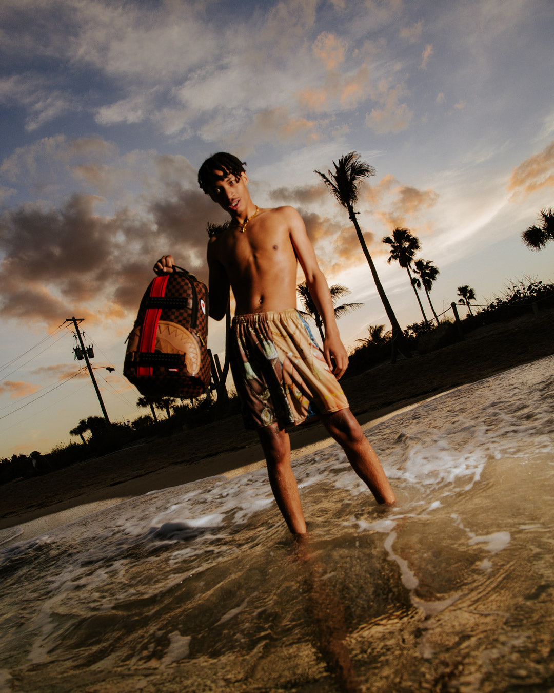 HENNY VICTORY LAP SKATEBOARD-STRAP BACKPACK